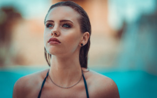 Woman necklace looking up building - a necklace free wallpaper