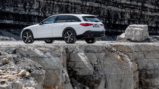 White car cliff rock formation - near free wallpaper