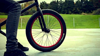 Person riding bike paved surface - allen tupper true free wallpaper
