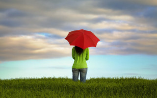 Woman umbrella field clouds sunset - an umbrella over her head free wallpaper