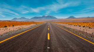 Mountain road blue sky clouds - a long road free wallpaper