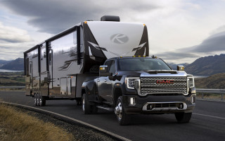 Truck trailer highway mountains clouds - a trailer free wallpaper