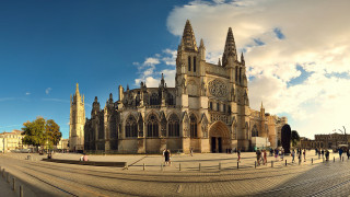 Cathedral clock tower people walking - the front of its free wallpaper