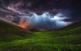 Stormy mountains green field forest - a storm free wallpaper