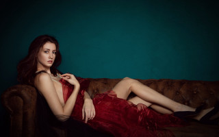 Woman red dress couch fashion - a couch free wallpaper