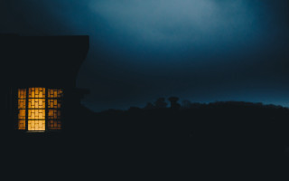 Window lit dark night sky - brutalism free wallpaper