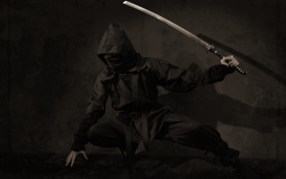 Man hooded jacket sword dark - jacket holding free wallpaper