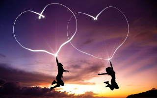 Flying people hearts sky above - a sunset in the background free wallpaper