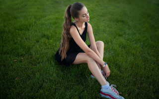 Girl sitting on grass nature 2 - her head free wallpaper