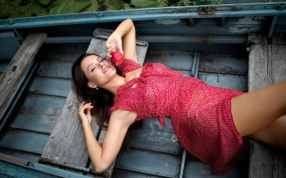 Woman red dress boat water 3 - her arm free wallpaper