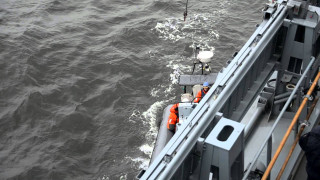 Boat crane water man standing - a crane free wallpaper
