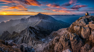 Mountain top sunset person sky - a mountain top free wallpaper