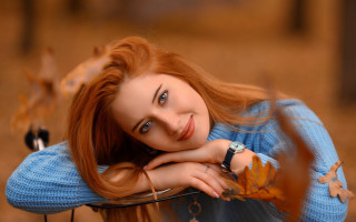 Redhair woman leaning car posing - a car free wallpaper