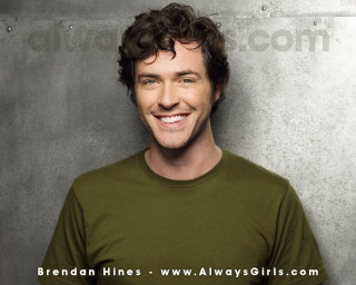 Man smiling green shirt black - brian thomas free wallpaper