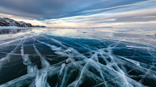 Frozen lake mountains sunset cloudy - ice free wallpaper