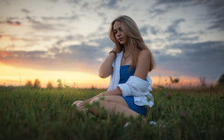 Woman field blue dress sitting - a stock photo free wallpaper