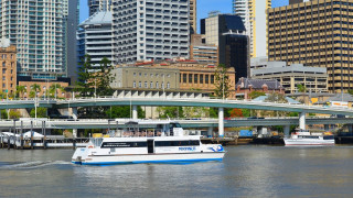 Boat river city skyline tall - a river next free wallpaper