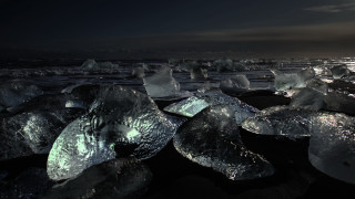Ice chunks beach night full - a dark sky above free wallpaper