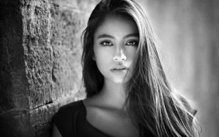 Woman long hair wall blowing - long hair leaning against a wall free wallpaper