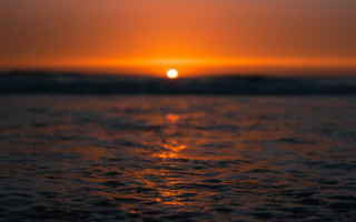 Sunset ocean wave shore cloudy - sunset free wallpaper