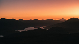 Sunset lake mountains bird ada - over the water free wallpaper