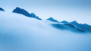 Mountain range fog clouds blue - volumetric fog free wallpaper