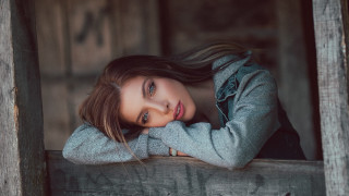 Woman leaning wooden ledge serious - serious free wallpaper for desktop