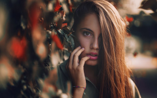 Red haired woman serious portrait 2 - long red hair free wallpaper