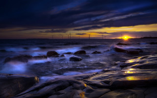 Sunset ocean waves rocks windmills - wave free wallpaper