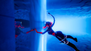 Woman diving blue water tunnel - wet free wallpaper