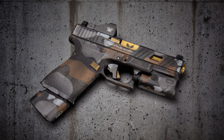 Camouflaged gun concrete yellow light - a concrete surface free wallpaper