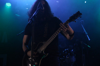 Man long hair guitar stage 3 - a guitar free wallpaper