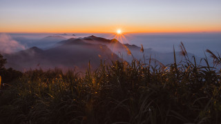 Sunset mountain foggy valley trees - a foggy valley below free wallpaper