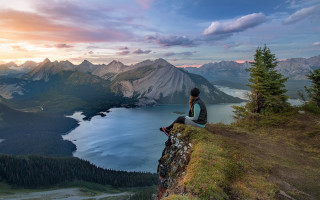 Cliff lake mountains sunset man 2 - his lap free wallpaper