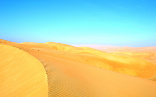Desert horse rider blue sky - a person riding free wallpaper