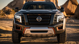 Black truck desert rocks trees - a rock formation in the background free wallpaper