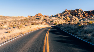 Desert road mountain sky clouds - a road in the desert free wallpaper