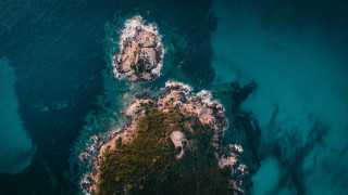 Boat rocky shore microscopic night - filip hodas free wallpaper