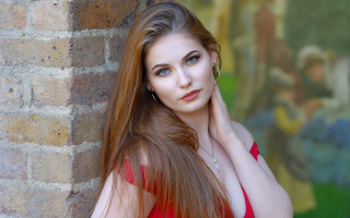 Woman long hair brick wall 9 - free portrait wallpaper