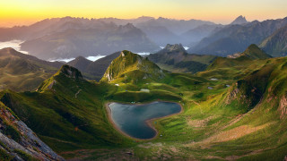 Mountain lake forest sunset cloudy - a mountain range in the background free wallpaper