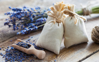 Lavender bags wooden table arts - product photography free wallpaper