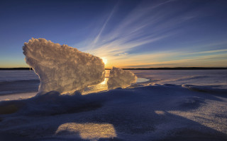 Iceberg frozen lake sunset clouds - a large iceberg free wallpaper