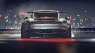 Silver sports car night city 3 - a city skyline in the background free wallpaper