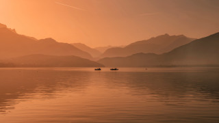 Boats lake sunset mountains clouds - a couple of boats free wallpaper