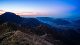 Mountain range sunset cityscape blue - a view of a mountain range free wallpaper