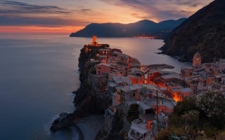Cliff village ocean sunset mountain - a village free wallpaper