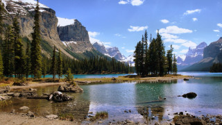Lake mountains trees sky clouds 43 - a rocky shore free wallpaper