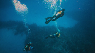 Underwater scuba diving holography galaxy - their face and body free wallpaper