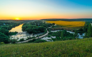 Lush green river hillside sunset - a lush green countryside next free wallpaper