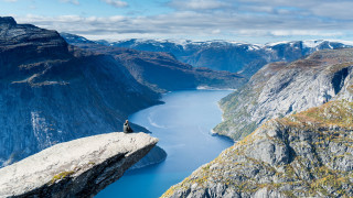 Rock lake mountains clouds sky - sense of awe free wallpaper